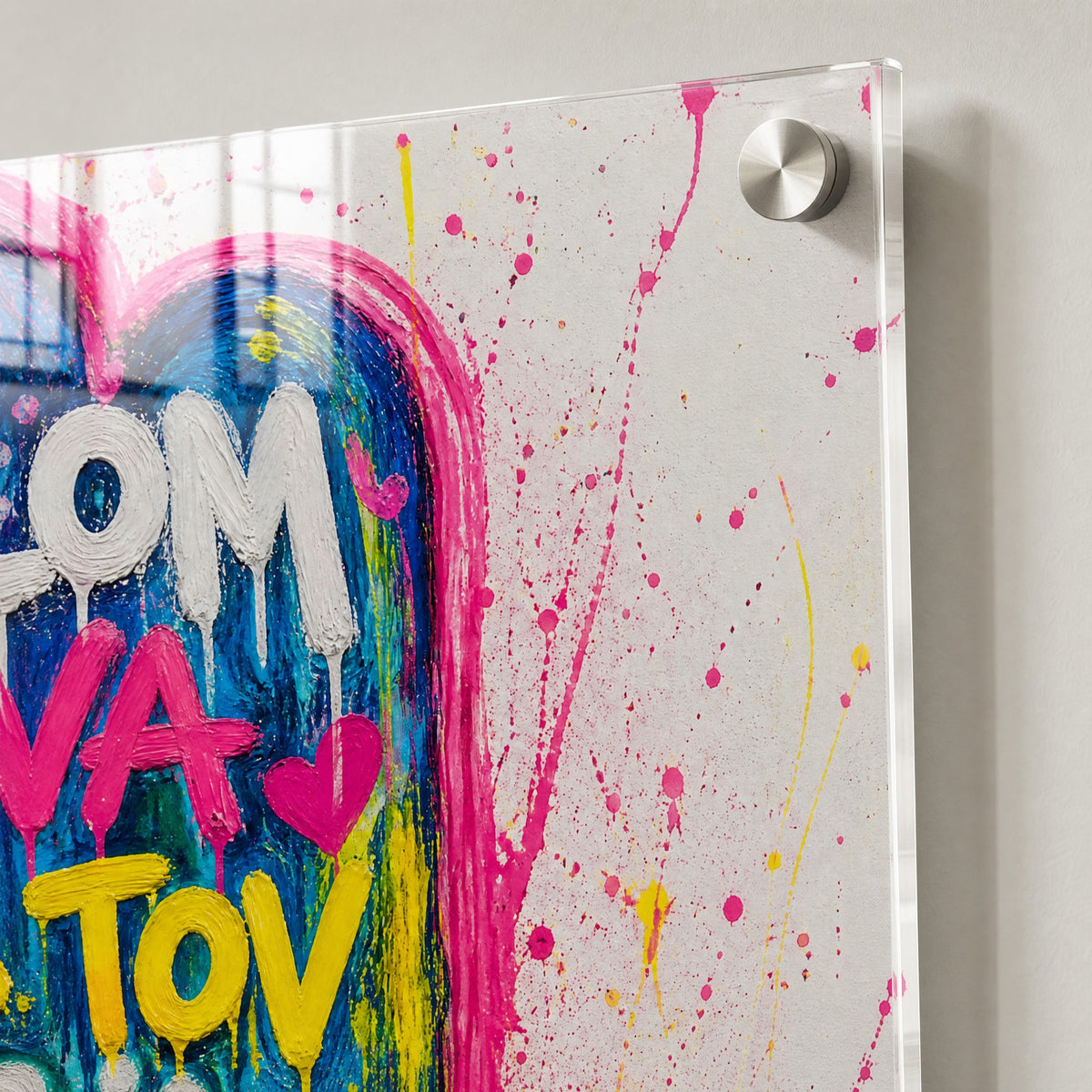 Close-up: the clear polished acrylic edge and a stainless steel standoff
